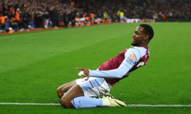 Jhon Durán knee slides after scoring during the Premier League match between Aston Villa and Liverpool at Villa Park on 13 May 2024